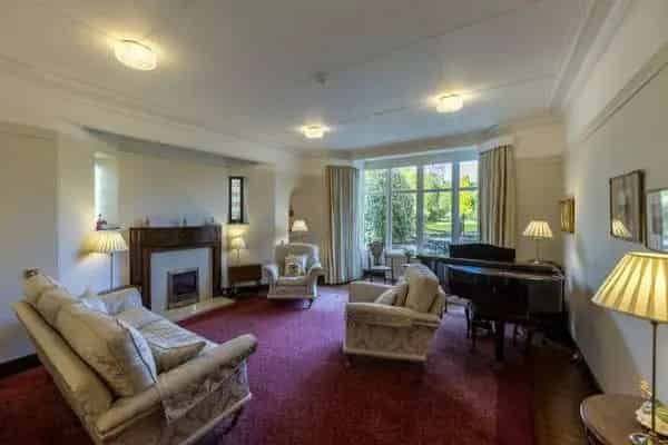 Spacious Family Home with Extensive Gardens and Detached Garage