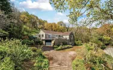 Spacious Detached Home with Stunning Views and Extensive Gardens