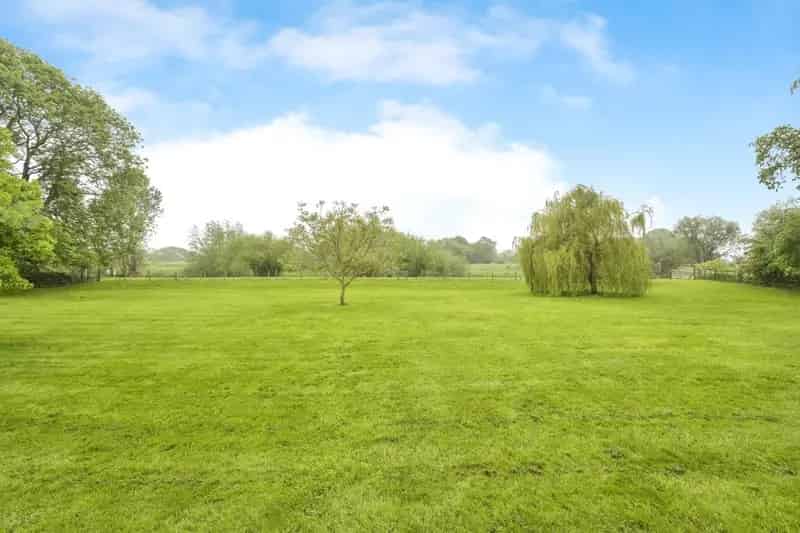 Family Home with 2 Acres, River Access & Outbuildings