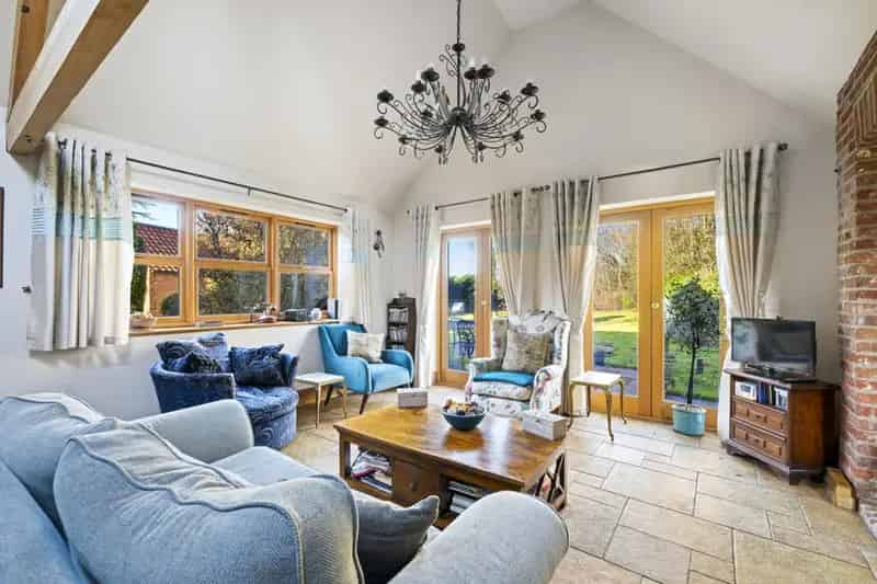 Spacious Farmhouse with Outbuildings and 0.37 Acre Plot