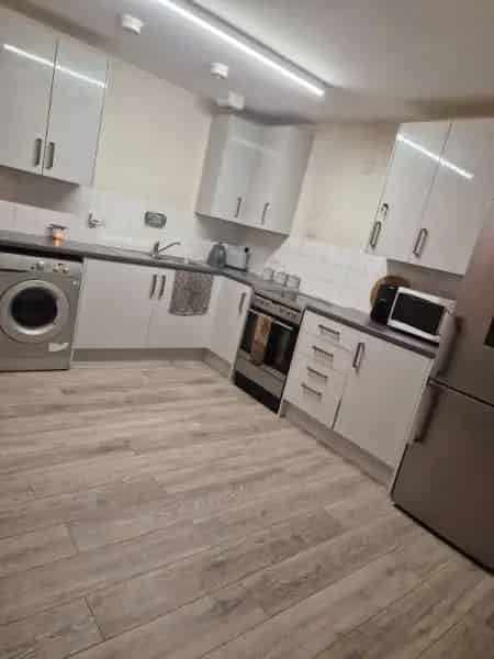 Spacious Ground Floor Flat with Garage and Parking Near Schools
