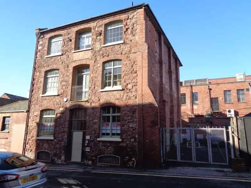 Historic Four-Story Building with Redevelopment Potential