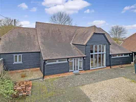 Restored Barn Conversion with Four Bedrooms and Extensive Living Space
