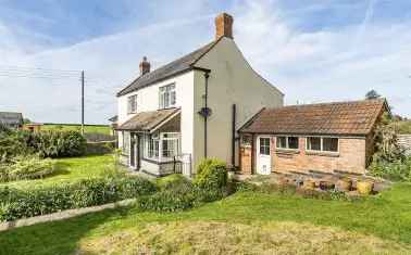 Detached Cottage in Meare Green with Outbuildings and Countryside Views