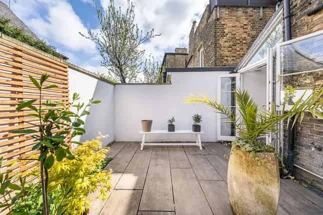 Terraced House for Sale in London SW19