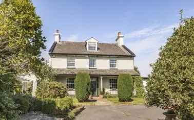 Characterful Barn Conversion Near Exeter with 5 Bedrooms and Mature Gardens