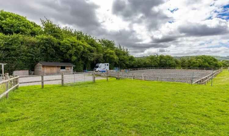 7.82 Acre Equestrian Property with Floodlit Manège and Stables