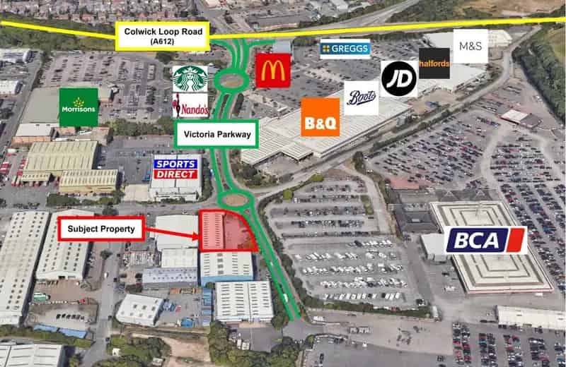 Industrial Unit with Mezzanine Floor and Ample Parking