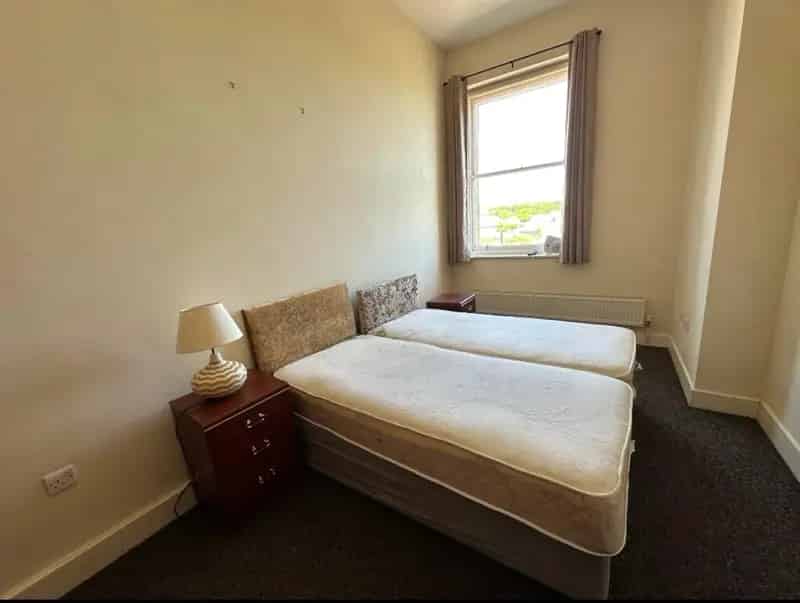 Spacious 2-Bedroom Top Floor Apartment with Parking