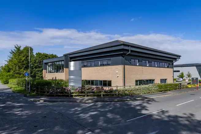 Modern Office Building with Ample Parking and Expansion Potential