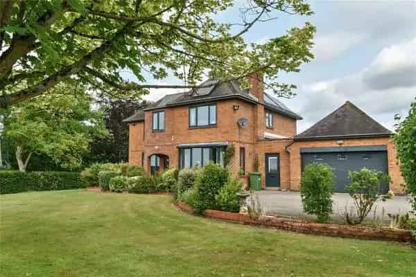 Spacious Family Home with Modern Amenities and Extensive Gardens