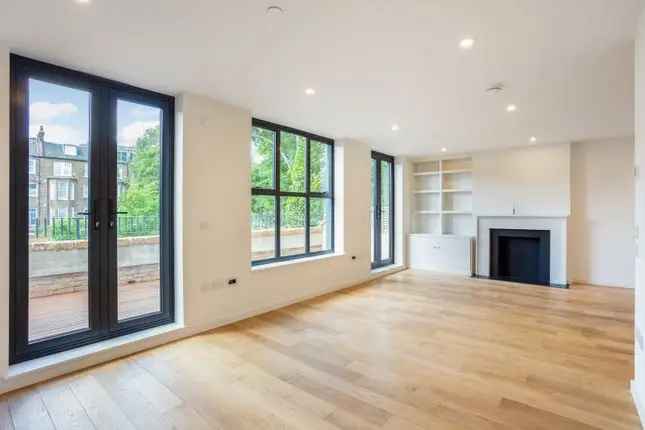 Detached House for Sale in Russell Gardens Mews London W14