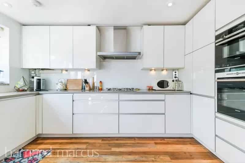 Three-Floor Home with Landscaped Garden and Luxurious Master Suite