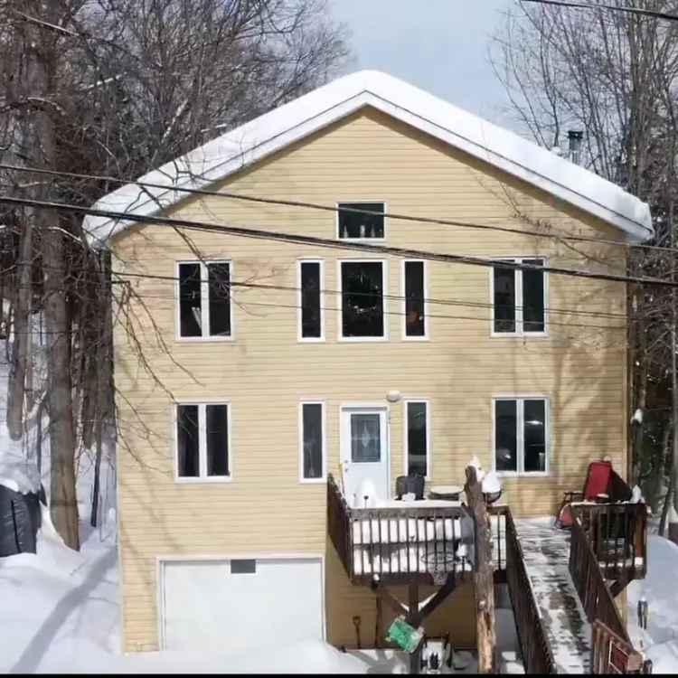 House for Sale in Magog Near Mountains and Lakes