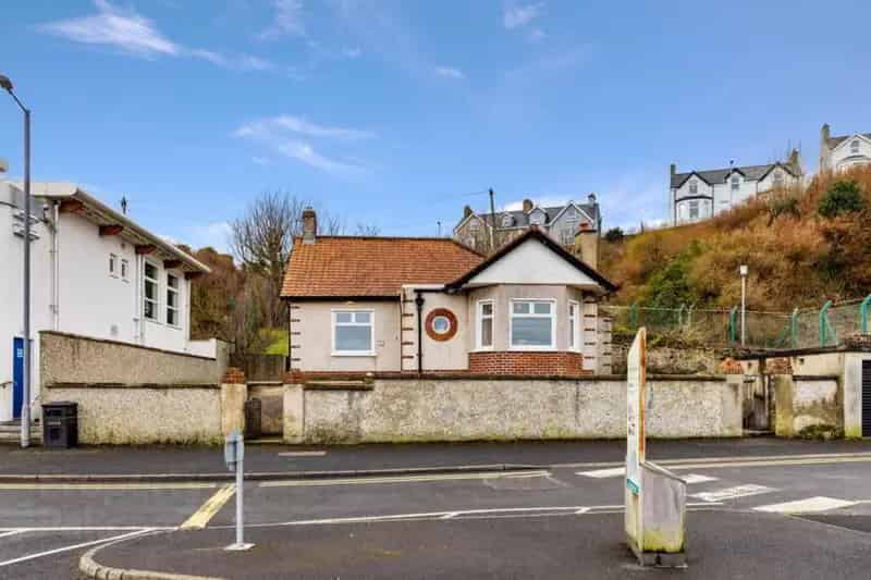 Seafront Bungalow with Panoramic Views and Development Potential
