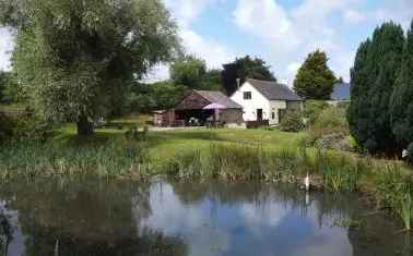 Spacious Converted Barn with 1.95 Acres and Modern Amenities