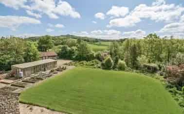 5-Bed Country Home with 1.68 Acres and Outbuildings