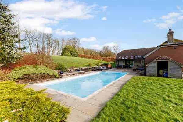 Spacious Family Home with Mature Gardens and Swimming Pool