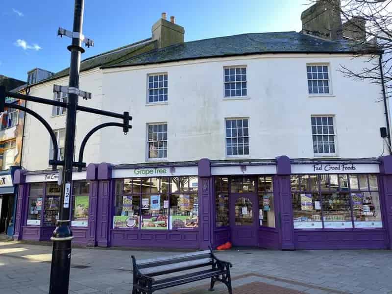 Two Story Brick Building with Retail Space and Development Potential