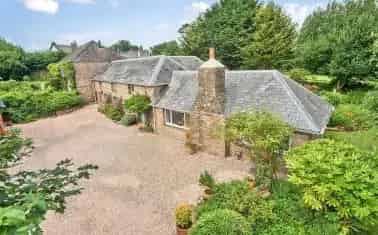 Spacious Barn Conversion near Totnes with Four Bedrooms and Gardens