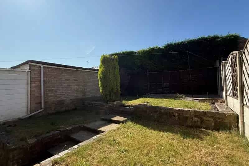 Spacious 3-Bedroom Family Home with Garden and Garage