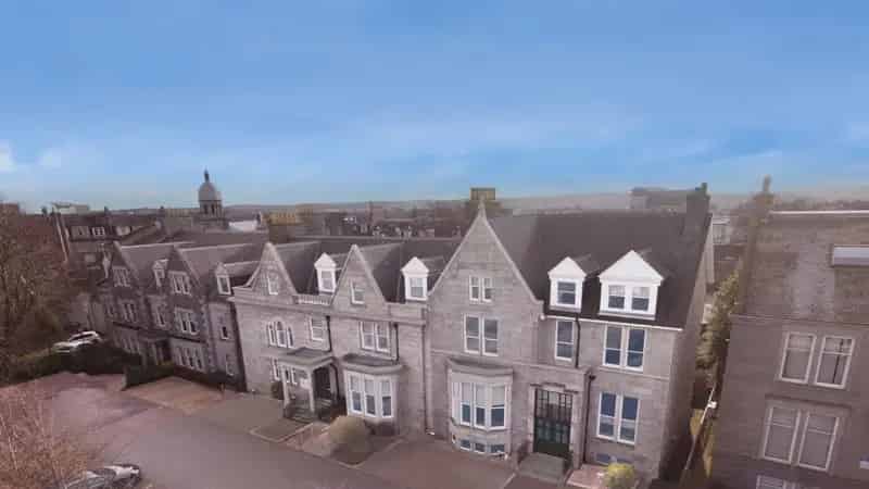 Three-Storey Office Building with Modern Extension