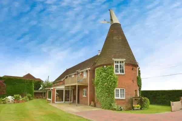 Spacious Family Home with 1.5 Acres of Gardens and Detached Garage