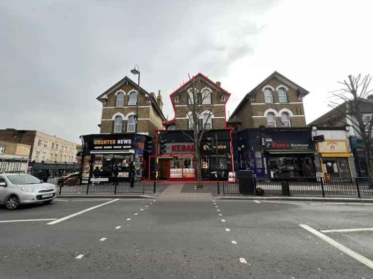 Freehold Retail and Residential Investment with Development Potential