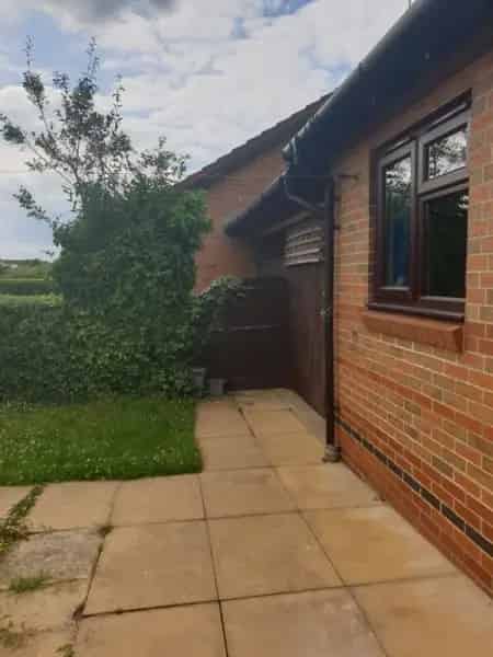 House Near Bus Stop with Driveway and Gardens