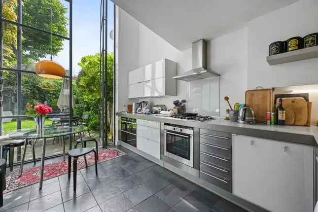 Terraced house for sale in Luxemburg Gardens, London W6