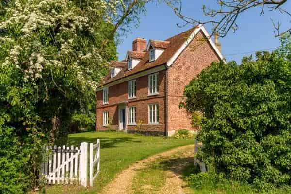 Grade II Listed Farmhouse with Mature Gardens and Outbuildings