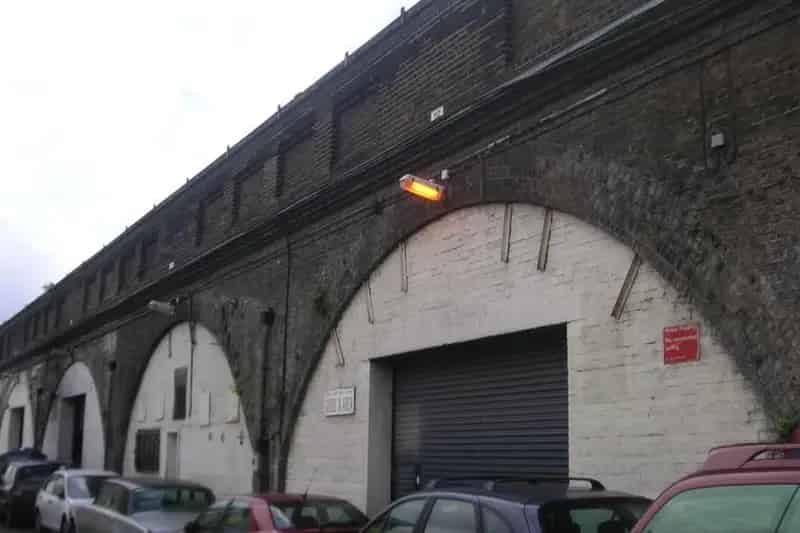 Arch Construction Property with Concrete Floor and Roller Shutter