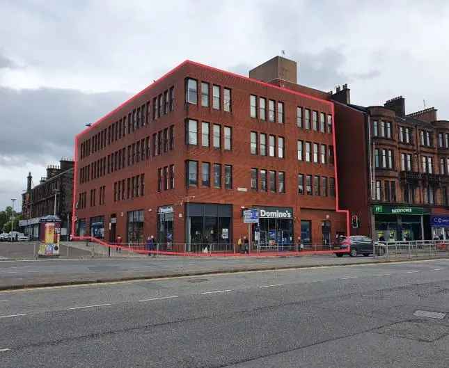 Modern Four-Story Building with Retail and Office Space