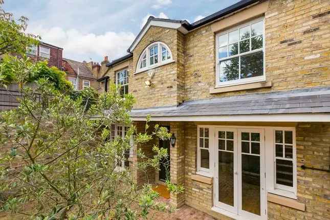 Detached house to rent in Station Road, London SW13