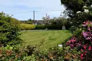 Spacious Detached Bungalow with Integral Garage and Mature Gardens