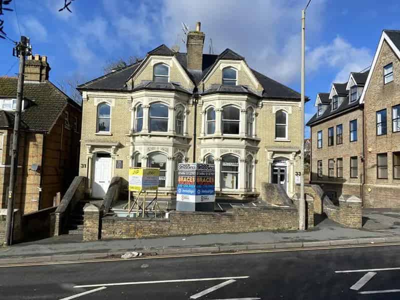 Four-Floor Building with Three 2-Bed Flats and Orthodontist Practice