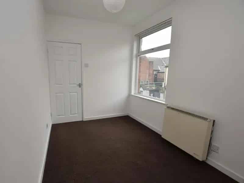 Commercial Unit and 2-Bed Apartment Freehold Investment