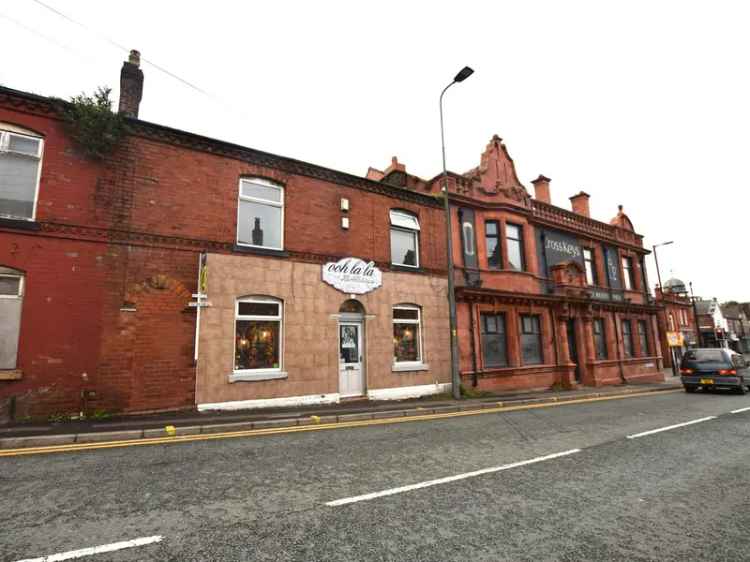 Commercial Unit and 2-Bedroom Apartment Freehold Investment