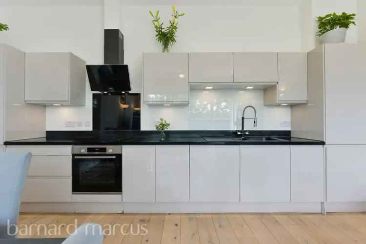 1066 sq ft Leatherhead Penthouse Apartment with Balcony and Parking