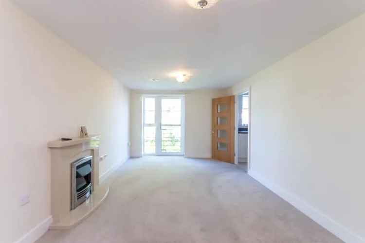 Retirement Apartment with Communal Gardens and Parking