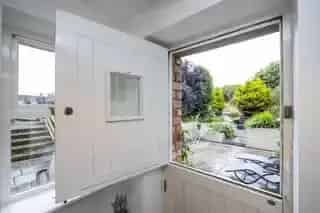 Detached Stone Residence with Converted Barn Office and Gym