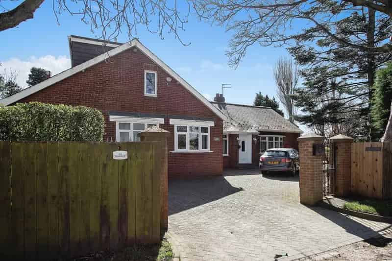 Luxury 34 Detached Bungalow with Landscaped Gardens and Double Garage