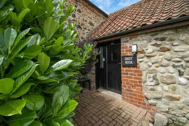 Five Cottages on Three Acres with Arable Land and Outbuildings