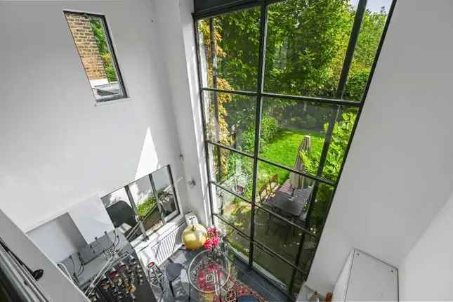 Terraced house for sale in Luxemburg Gardens, London W6