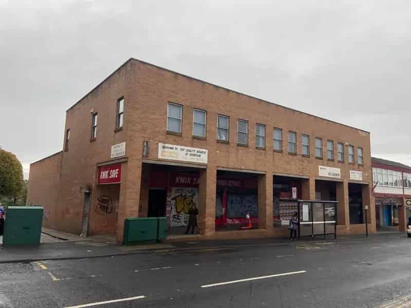 Retail Unit with Offices and Basement Storage For Sale
