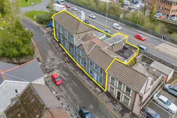Commercial Property with Caretaker Flat Development Potential