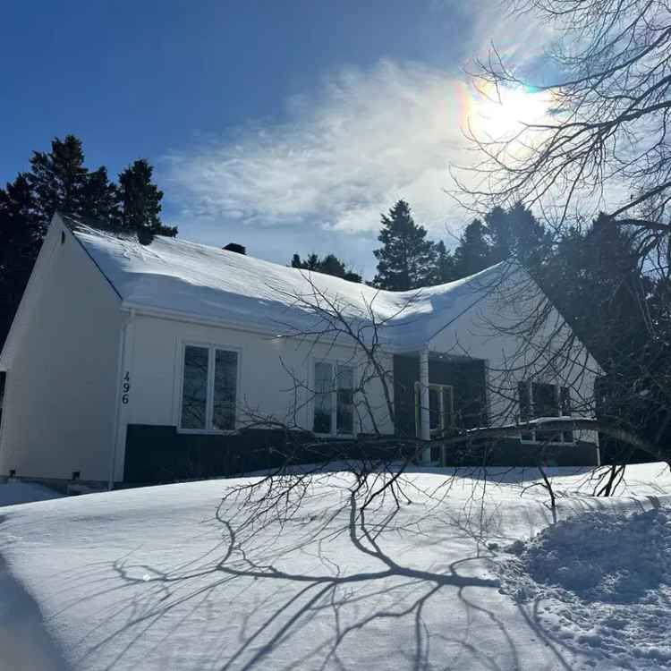 4-Bedroom House with Finished Basement and Sunny Backyard