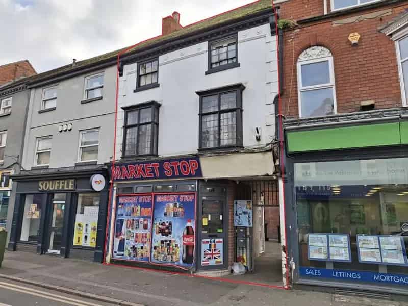 Three-Story Building with Shop and Flat