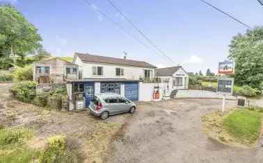 Former Petrol Station with Bungalow and Workshops