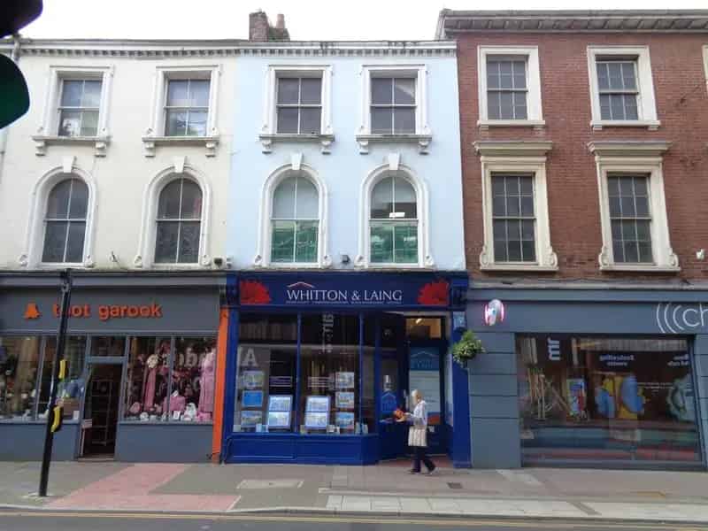 Four-Story Commercial Building with Retail and Office Space